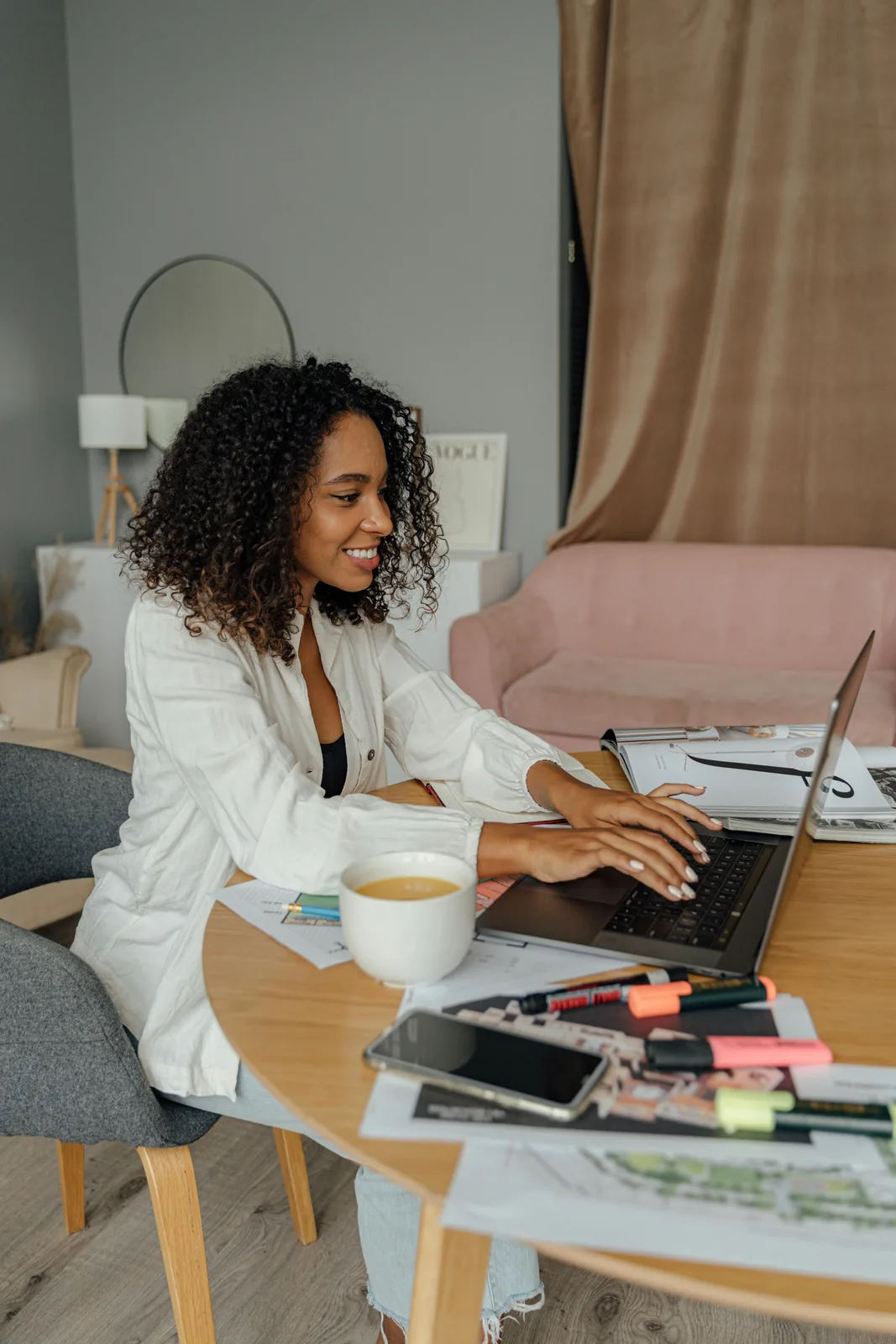 An African creator in the UK working on her content and business planning.